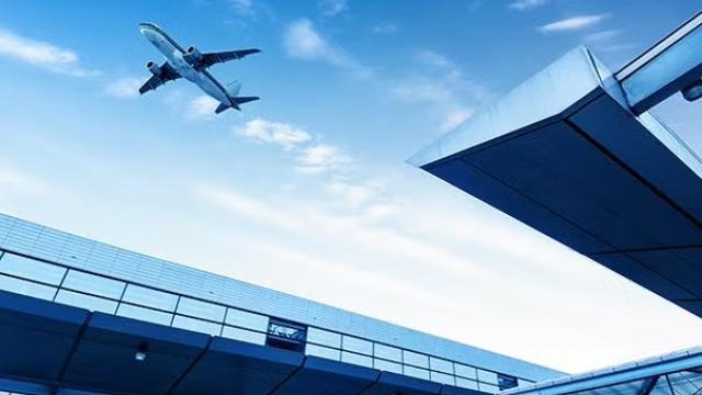 Plane taking off representing Flight Centre Travel Group releasing its year-end results 