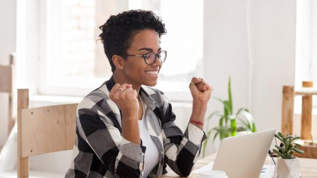 Woman happy her trip has been approved