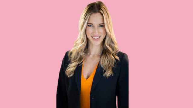 Headshot of Kimberly Sweeney with pink background