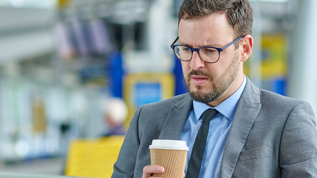 Concerned looking man in airport