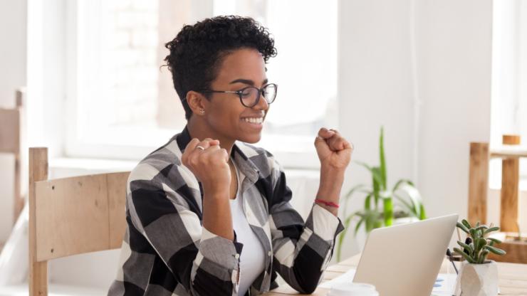 Woman happy her trip has been approved