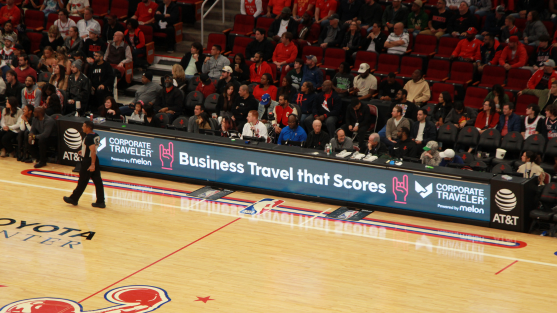 Corporate Traveler signage at rockets game