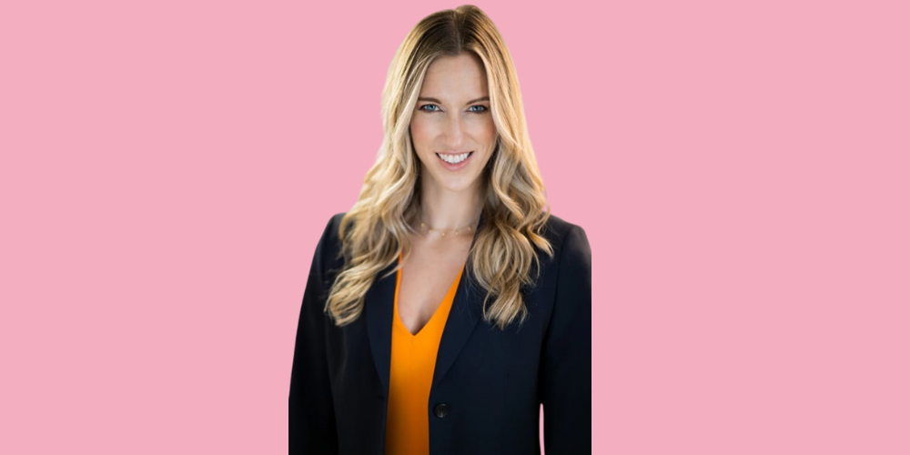 Headshot of Kimberly Sweeney with pink background