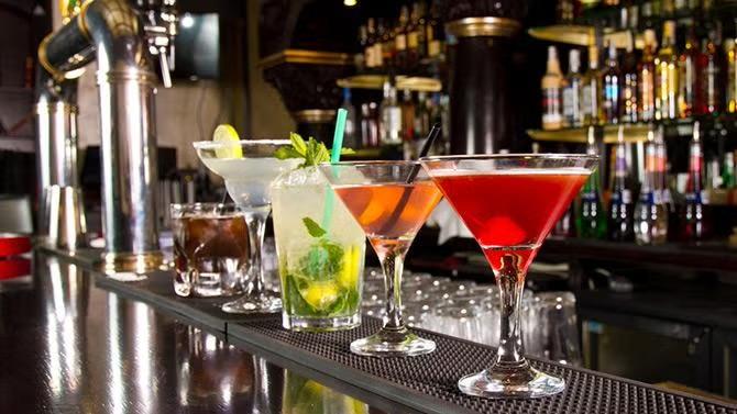 Cocktails sitting on a bar, showcasing tourist attractions in the Los Angeles travel guide. 