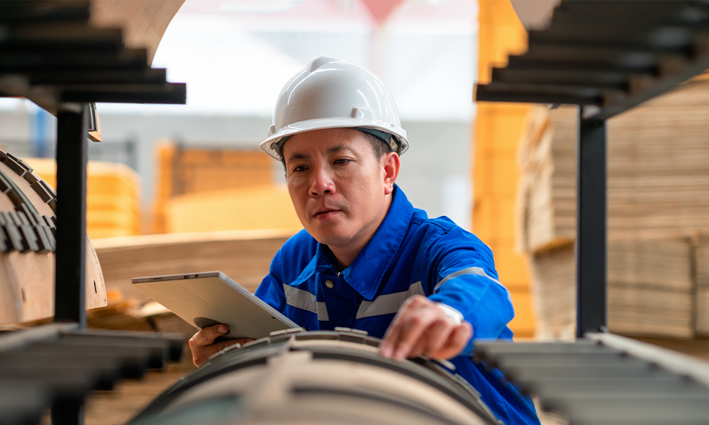 A manufacturing man doing paperwork